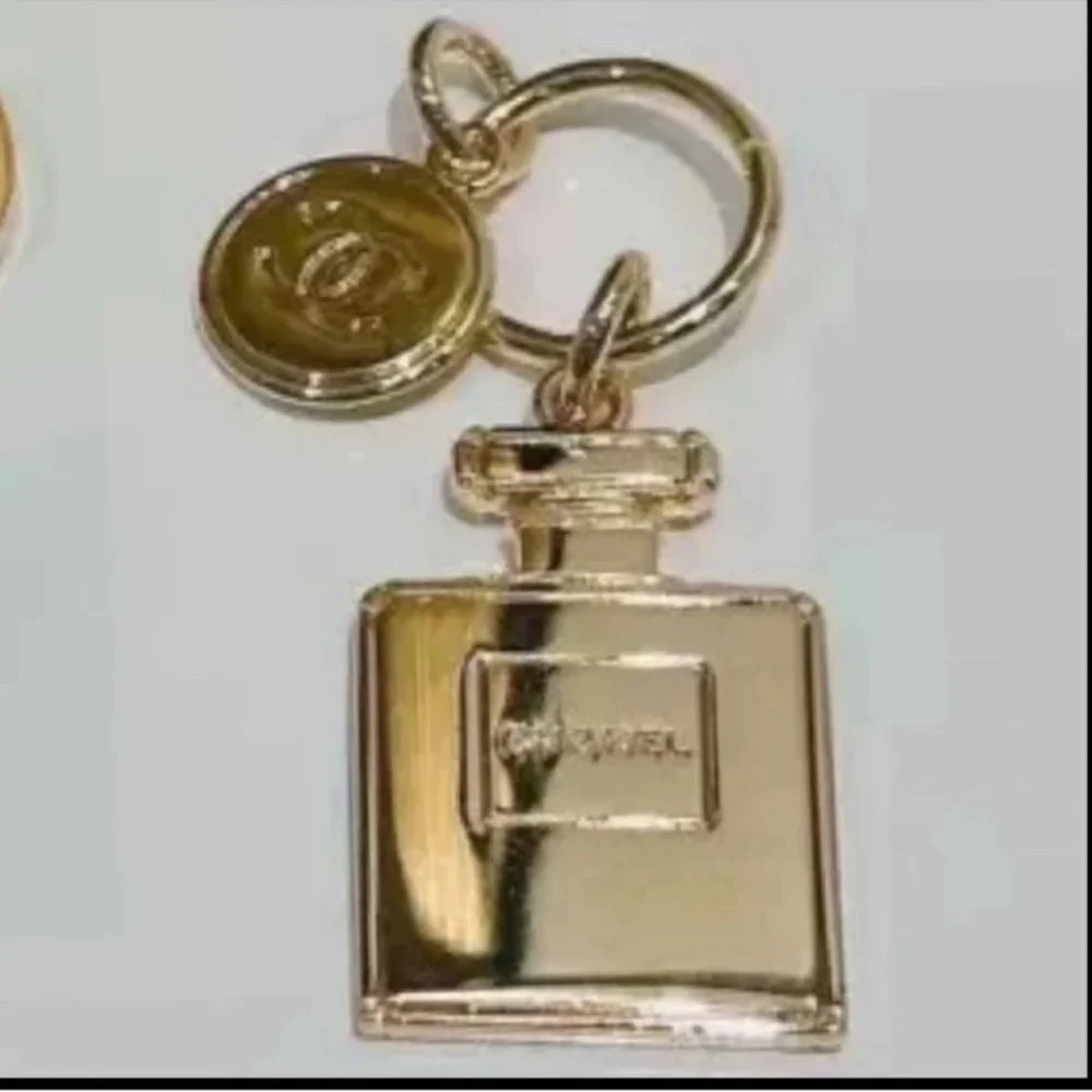 Chanel Holiday Fragrance Charm With Gold and Pearl Necklace
